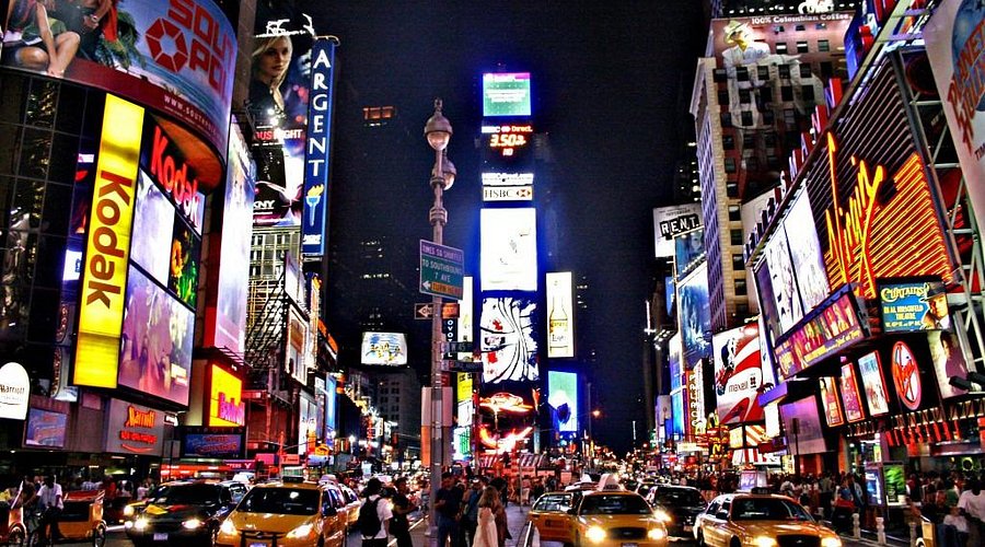 Broadway theater district lit up at night